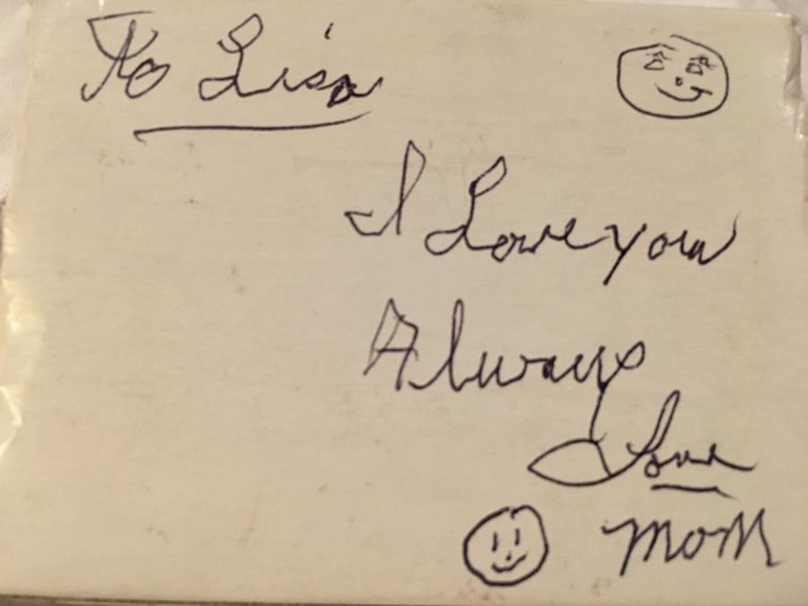 A handwritten note from Lisa's mother: To Lisa, I love you always — Mom