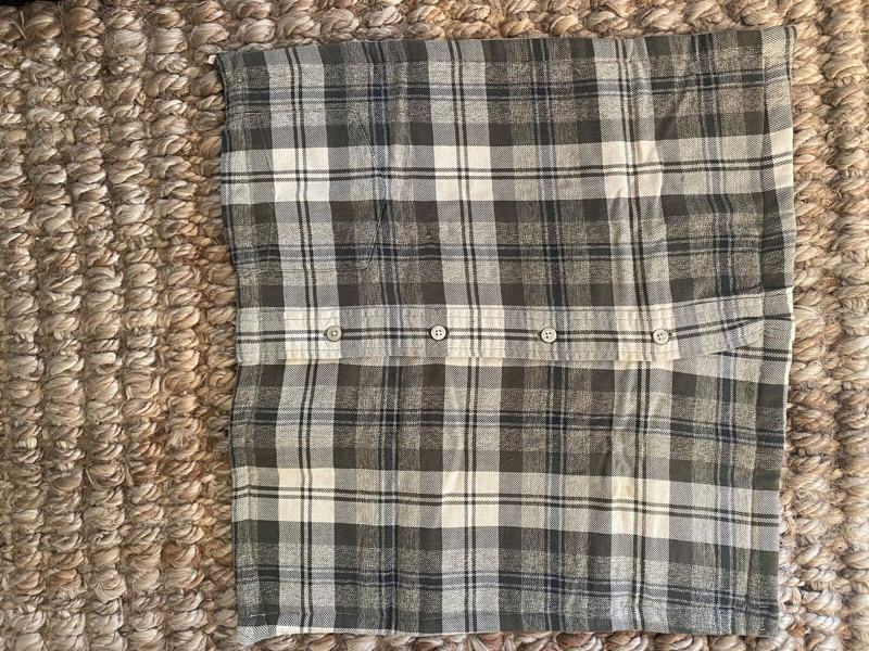 Back of memory quilt in gray plaid