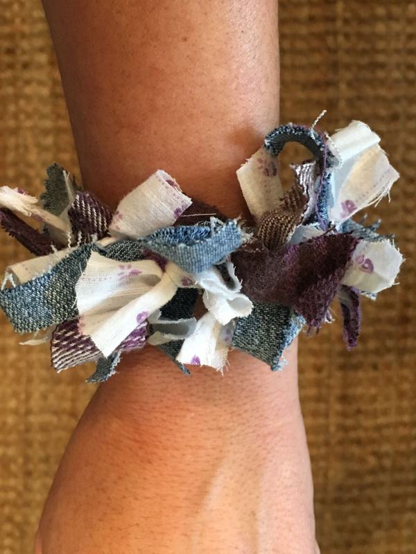 Fabric keepsake bracelet worn on a wrist