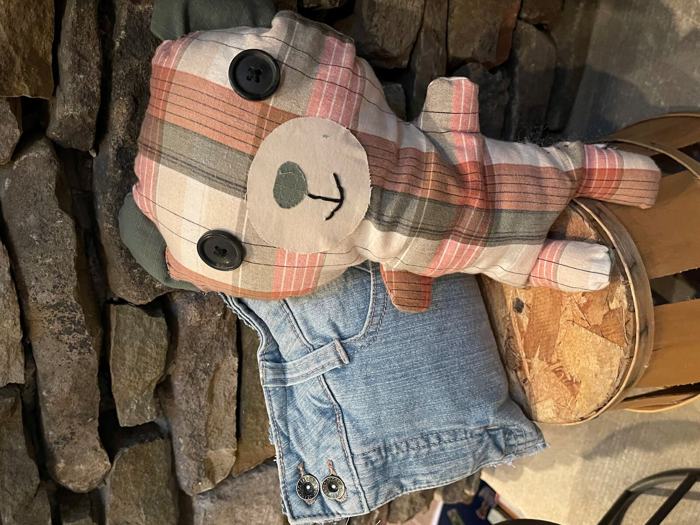 Memory bear and pillow made from a mother's clothing