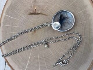 Pet pendant necklace with fur inlay and stamped paw print accent