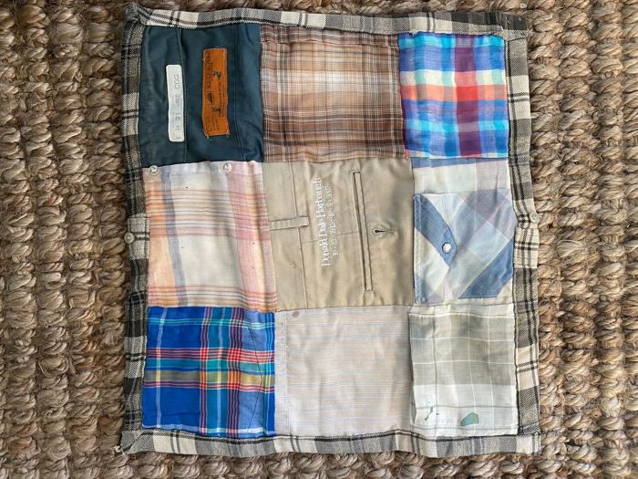 Memory quilt sewn from a father's plaid shirts